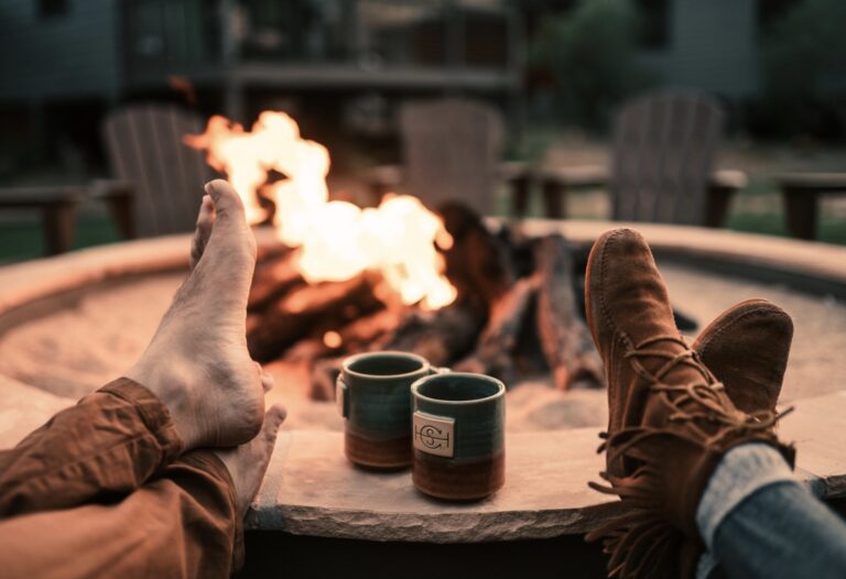 Couple cozy by fire