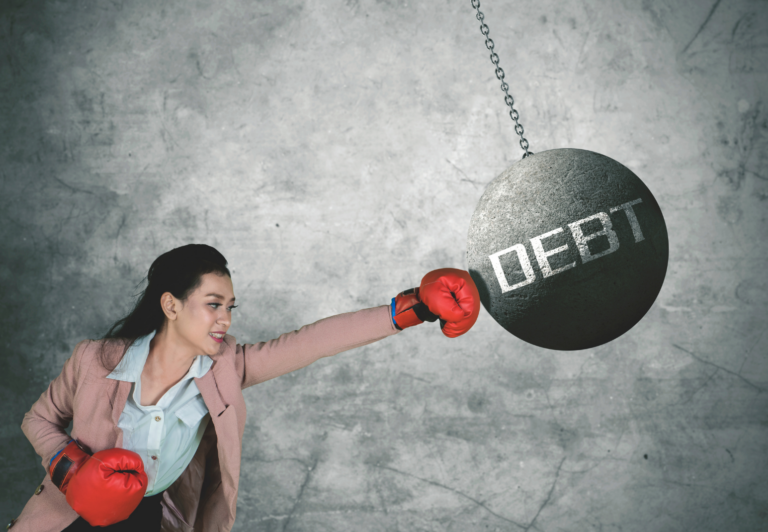 woman punching out debt